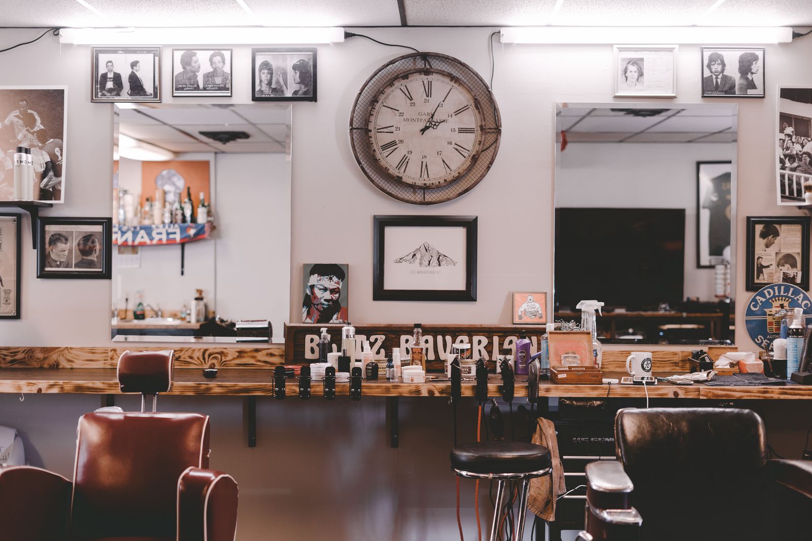 Inside a classic barbershop with mirrors and barber chairs